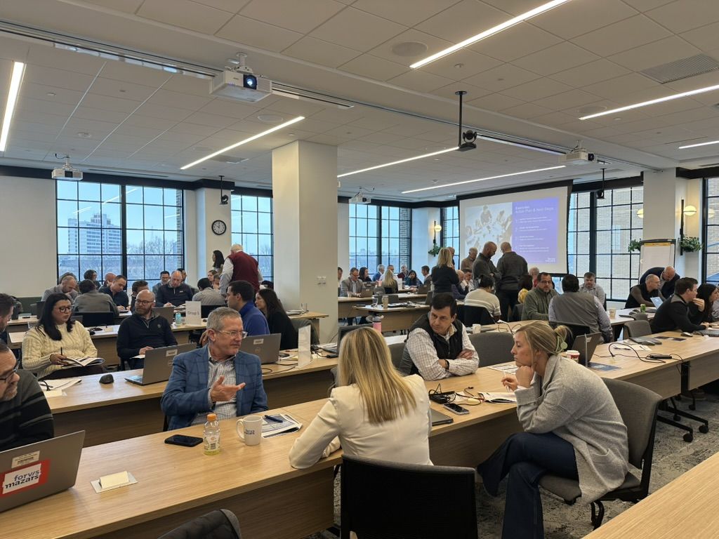 Forvis Mazars professionals at workshop tables during an action plan and next steps exercise
