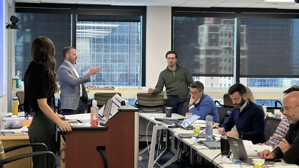 Roundtable working session with leaders discussing AI adoption